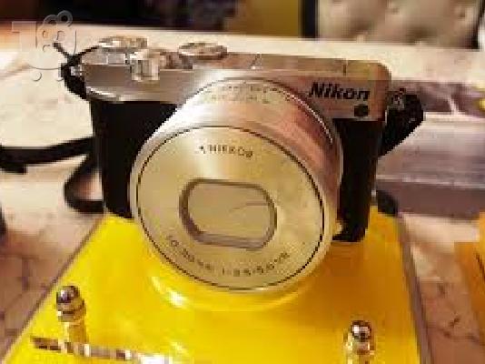 Nikon 1 J5 Mirrorless Digital Camera w/ 10-100mm Lens (Silver)